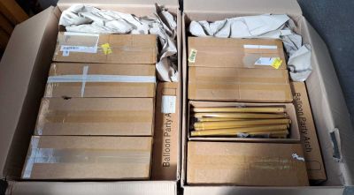 several cardboard boxes are stacked on top of each other in a box
