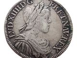 a close up of a coin on a white background