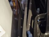 a lot of chairs and a table in a room