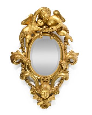 an image of a gold mirror with cherenshes and cherenshes on it