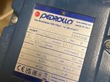 a close up of a blue machine with a label on it