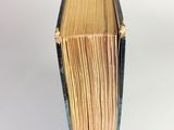 an open book that is sitting on a table