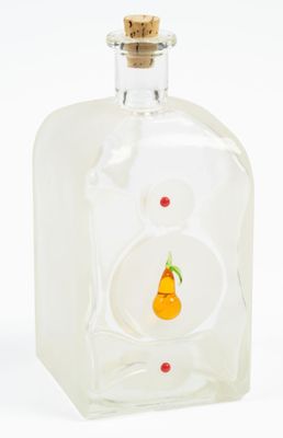 a glass bottle with a small orange inside of it