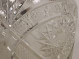 a glass vase that is sitting on a table