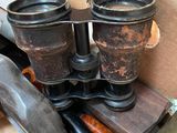 many different types of binoculars sitting in a box