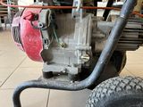 a small engine that is attached to a cart