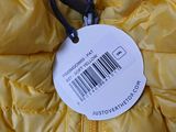 the label is attached to a yellow jacket with a barcode on it