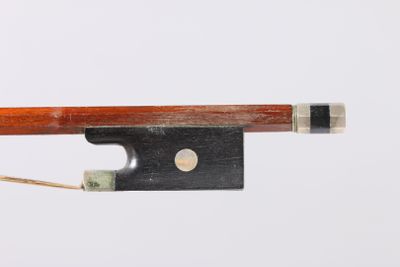 the bow is made of wood and has a metal tip