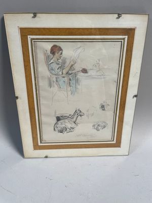 une vieille photo d'une femme assise à une table avec un chat