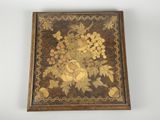an image of a wooden box with a painting of flowers on it