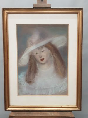 portrait of a young girl in a white dress with a white hat