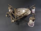 an image of a silver plate with a candle holder on top of it