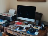 an image of a home office with a computer and printer