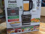 a box on the table with a blender inside of it