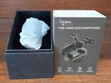 an image of a pair of wireless earphones in a box