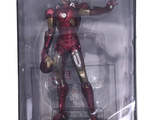 a figurine of iron man in a plastic box