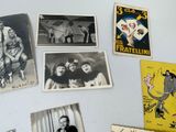 many old photos on the wall of a room