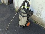 a hose that is attached to the side of a building