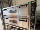 two ovens that are stacked on top of each other