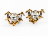 an image of a pair of gold and crystal earrings