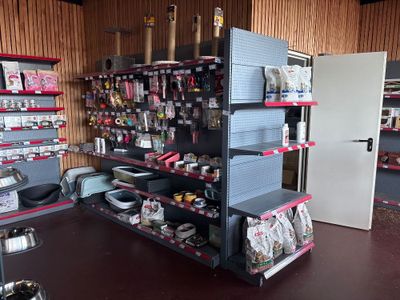 a refrigerator and a refrigerator freezer in a store