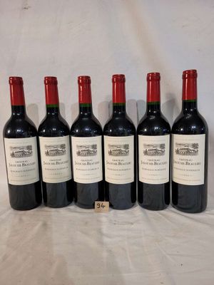 six bottles of red wine lined up in a row