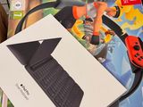 a box of nintendo wii remotes and a box of nintendo wii controllers