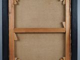 an old photo of a wooden frame with a picture in it