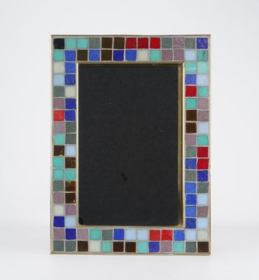a picture of a picture frame with a multi colored mosaic pattern