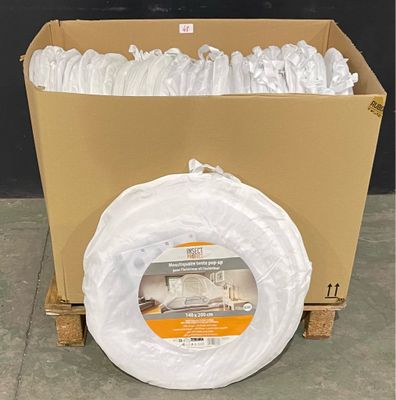 a cardboard box with a large roll of toilet paper in it