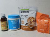 a bag of coffee, a bag of protein, and a bottle of coffee