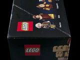 the box is open to show the contents of the lego disney set