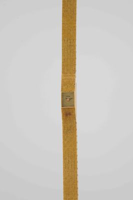 a gold colored watch with a metal clasp on a white background