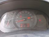a close up of a speedometer on a car ' s dashboard
