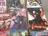 a lot of comic books that are on the table