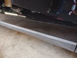 a close up of a car door with a handle on it