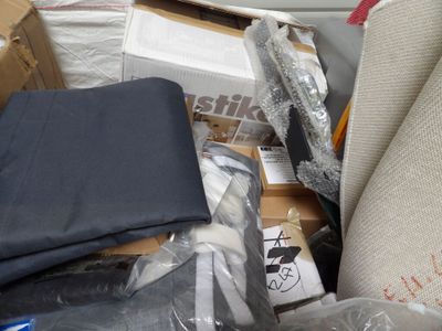 a pile of items that are sitting on the floor