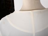 an image of a mannequin with a white shirt on it
