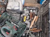 a box full of tools sitting on the floor