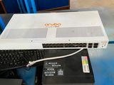 a computer sitting on top of a table in a warehouse