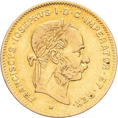 an image of a gold coin with an image of a man in a headdress