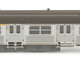 a train car that is sitting on a white surface