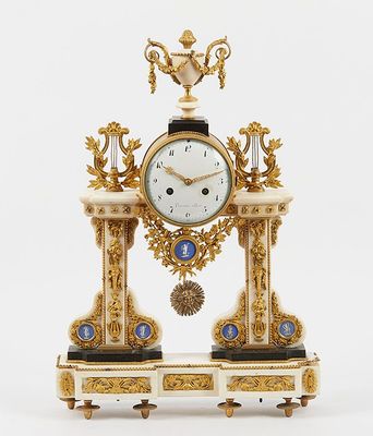 a clock that is sitting on top of a table