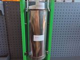 a large metal tank sitting on a stand in a store