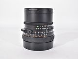 an image of a close up of a camera lens on a white surface