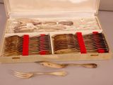 a box of silverware with forks and spoons in it