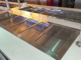 a long counter with a bunch of food items on it