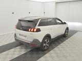 a picture of a white car parked in a garage