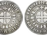 une pièce d'argent avec une croix au recto et une croix au verso