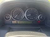 a car dashboard with various gauges and numbers on it